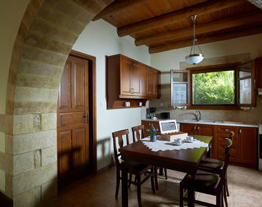 Vederi Estate Villa Kalypso kitchen with table and amenities