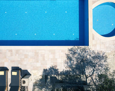 Vederi Estate Villa Melpomeni top-down view of the pools