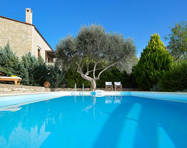 Vederi Estate Villa Kyveli private pool and two chairs at poolside