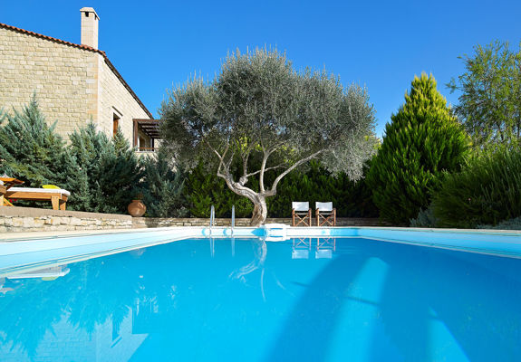 Vederi Estate Villa Kyveli private pool and two chairs at poolside